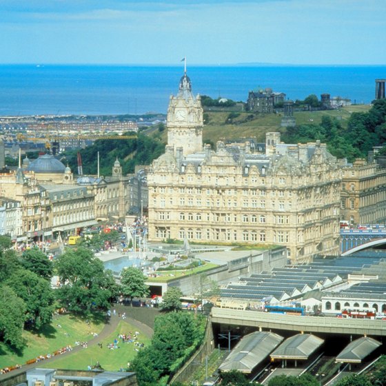 Trains from London to Edinburgh arrive at Waverley Station, next to the impressive Balmoral Hotel.