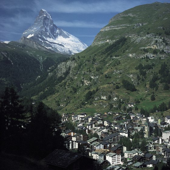 Quaint villages lie in the shadow of the Swiss Alps.