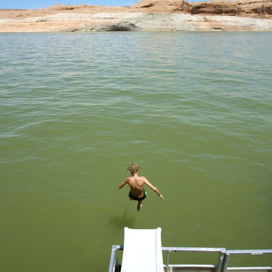 Kids of all ages enjoy sliding into the water from Lake Mead houseboat rentals.