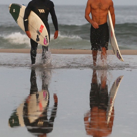 Surfers leave the water at Ocean City, Maryland.