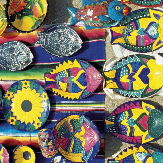 Colorful hand-painted wall hangings add Mexican flair to your home.