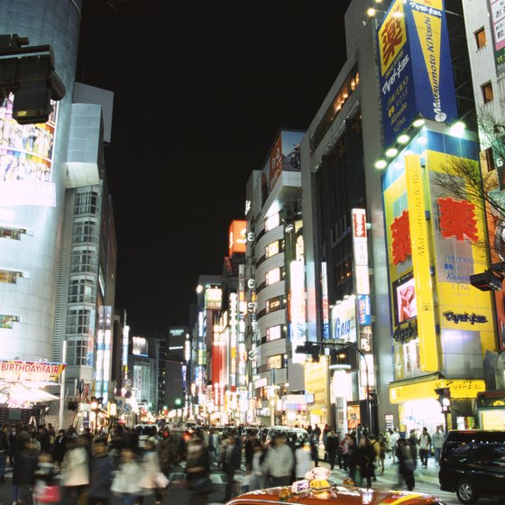 Day or night, Tokyo is a crowded city filled with sites for tourists to visit.