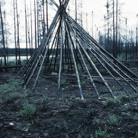 Teepees rest on a frame of poles, laid together and bound.
