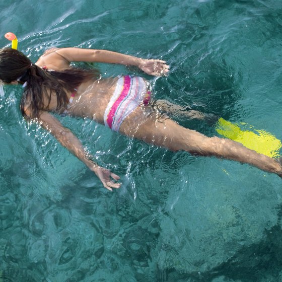 Fins help you navigate in the water when snorkeling.