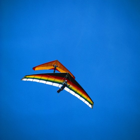 Take to the blue skies over Maui and other Hawaii locations in a hang glider on your next vacation.