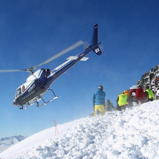 Snowboarders seeking high adventure beyond the lift lines should consider a heli-tour.