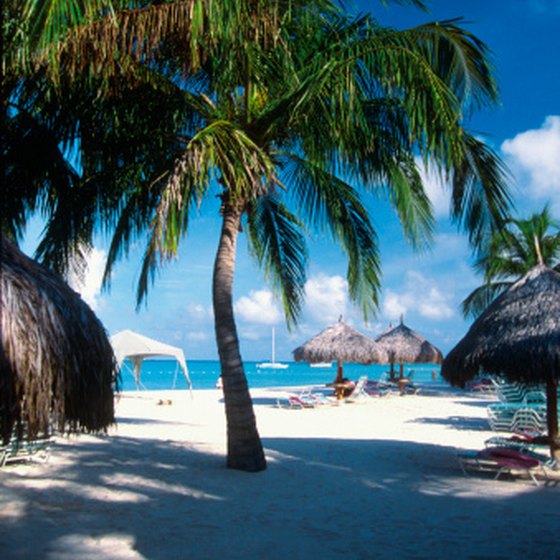Aruba's white sand beaches attract swimmers and sunbathers.