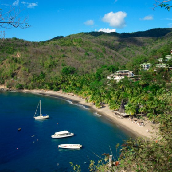 St. Lucia's natural beauty includes rolling hills, green foliage, blue waters and sandy beaches.