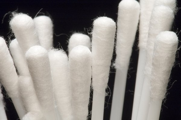 Use a cotton swab to clean finer details.