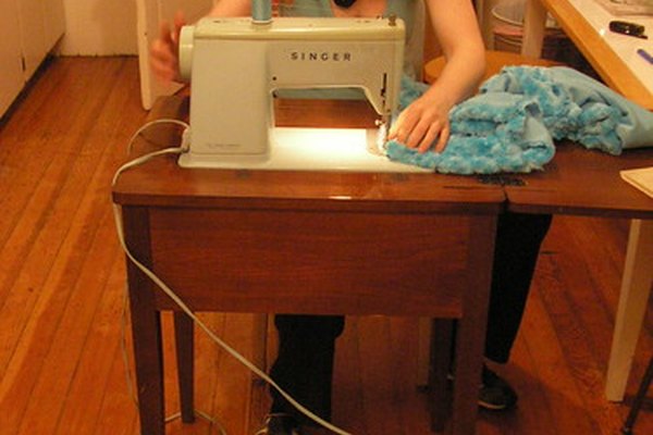 Máquina de coser de gabinete.