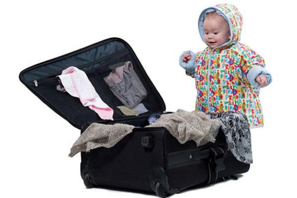 young traveler image by NiDerLander from Fotolia.com El nombre de tu agencia de viajes debe encender el sentido de pasión por los viajes de tus clientes.