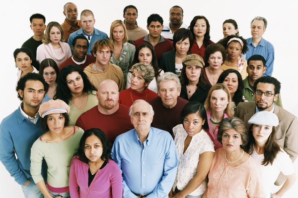 Studio Shot of a Large Mixed Age, Multiethnic Group of Men and Women Staring at the Camera in a Displeased Way