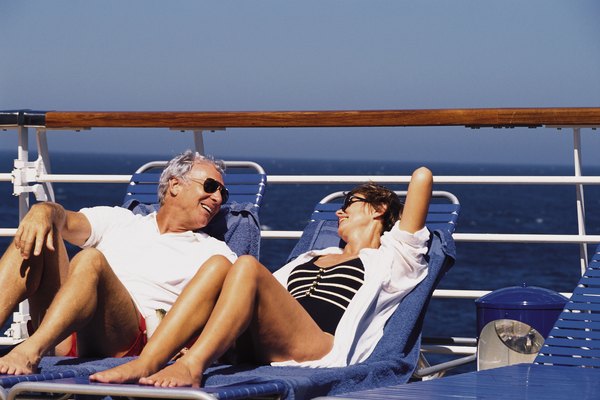 Mature couple on deck of cruise ship