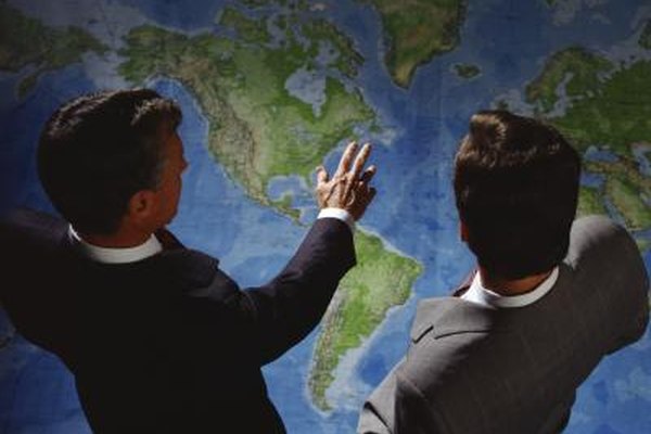 Jupiterimages/Photos.com/Getty Images Una empresa puede hacer crecer su mercado adquiriendo a otras del mismo sector en un punto geográfico diferente.
