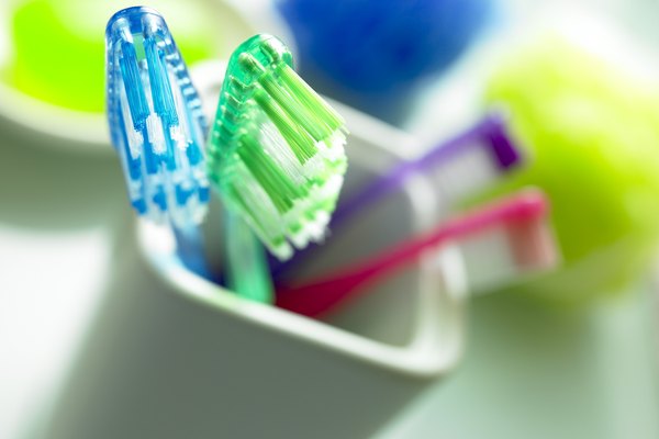Toothbrushes in container