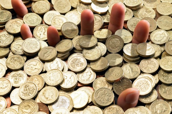Ahorrar monedas puede añadir suficientes fondos para querer un depósito en el banco.