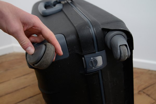 samsonite luggage wheel repair near me