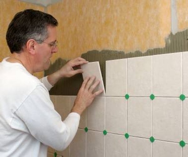 How To Reattach Plastic Bathroom Tile Homesteady