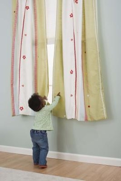 How to Attach a Curtain Room Divider to a Drop Ceiling