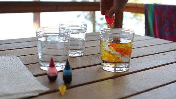 red food coloring in a cup