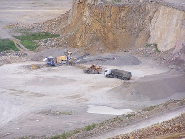 Farmers add limestone to their soil to make the pH more basic.