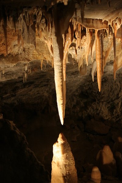 Stalagmites and stalactites result from mineral flows.