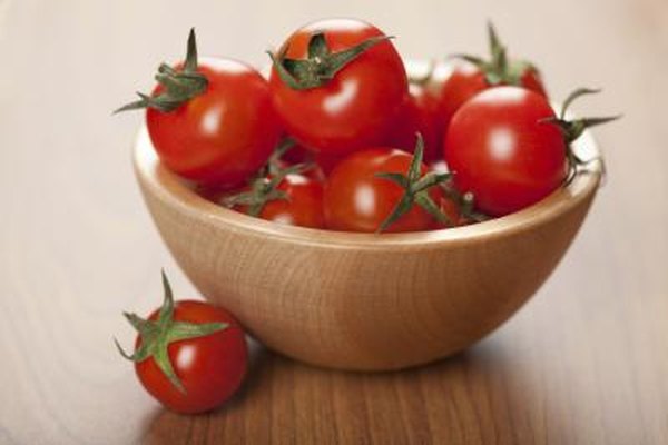 Photo Credit: OlgaMiltsova/iStock/Getty Images Bowl of ripe tomatoes