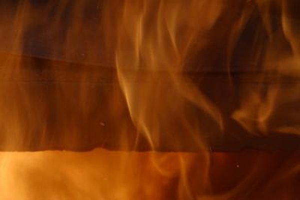 When a magnet is heated in a hot flame, it will lose its magnetization.