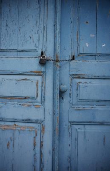 How to Make a Fence Out of Vintage Doors | HomeSteady