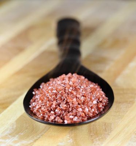 Red salt on a spoon.