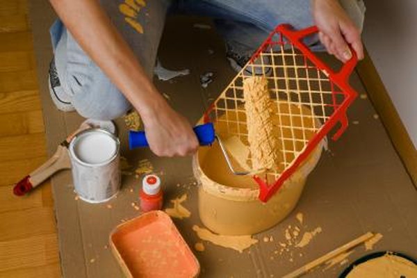 Photo Credit: Brigitte Wodicka/Hemera/Getty Images Woman with paint supplies