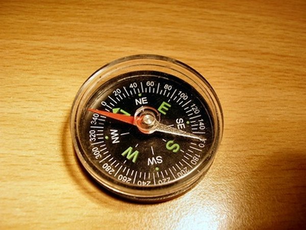 Photo Credit: boussole image by Anthony CALVO from <a href='http://www.fotolia.com'>Fotolia.com</a> Magnet in compass.