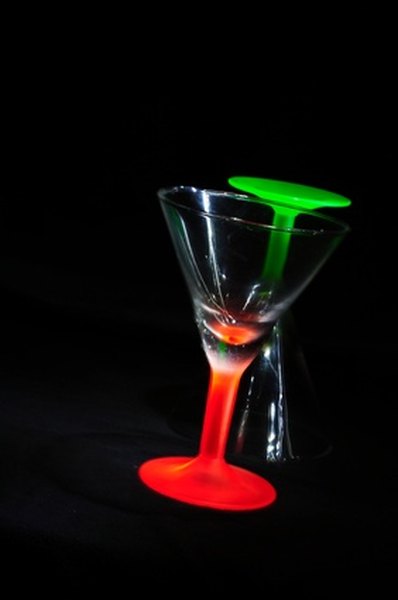 Photo Credit: red glass green glass image by Roman Kyrychenko from <a href='http://www.fotolia.com'>Fotolia.com</a> Use the rocks to score glass.