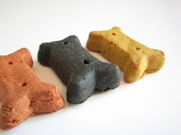 dog bones image by Janet Wall from Fotolia.com Free samples of different dog foods can help you determine which food to purchase long-term..