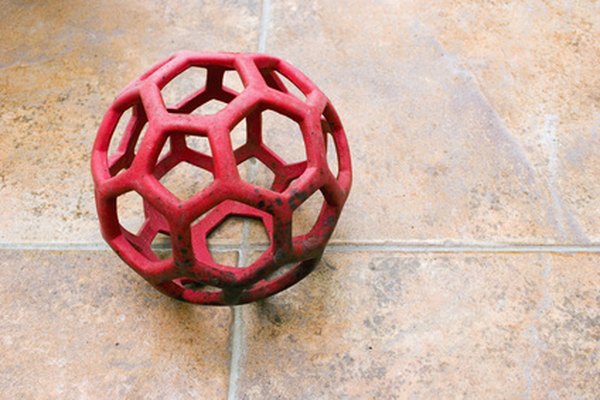 chew toy image by Undy from Fotolia.com A toy like this can be stuffed with treats for your dog to dig out.