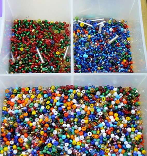 beads image by Alison Bowden from Fotolia.com Personalize beaded dog collars with colored beads.