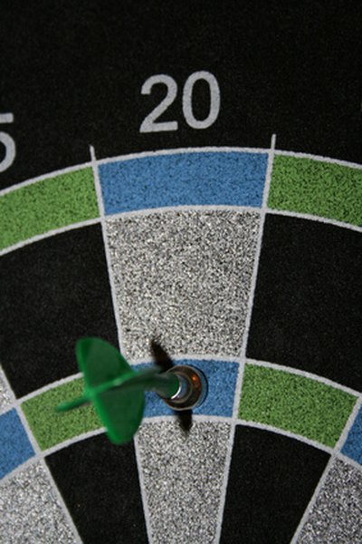 Photo Credit: magnetic dart board image by Christopher Nolan from <a href='http://www.fotolia.com'>Fotolia.com</a> Magnetic dart board.