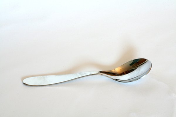 A metal spoon is electrically conductive.