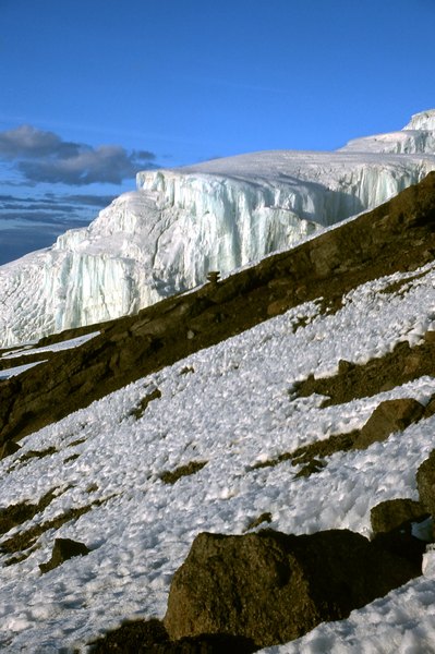 Glaciers carve into the crowns of many of the world's great volcanoes.