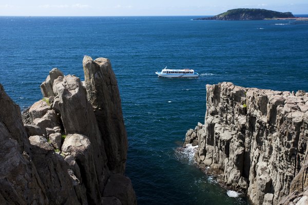 Rocky cliffs above the sea.