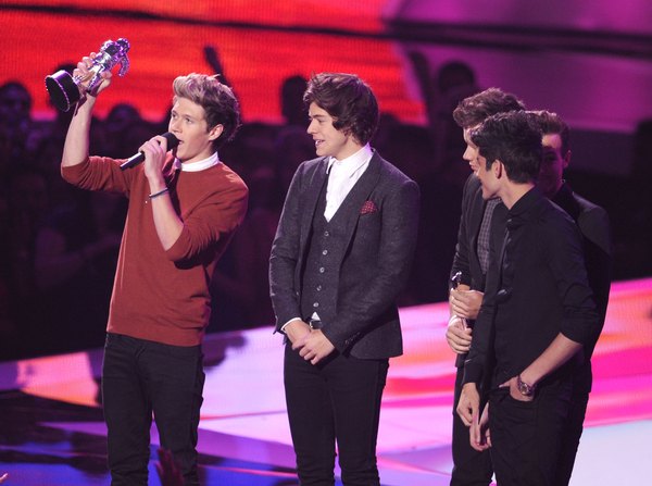 Os CDs do 1D alcançaram sucesso mundial em 2011 e 2013