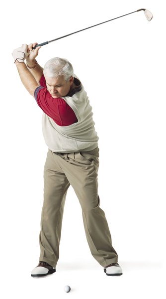 The left arm should be straight at the top of the backswing.