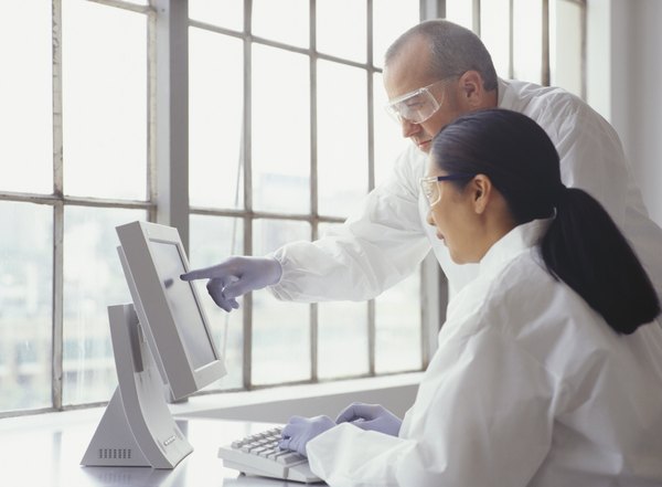 Photo Credit: Ryan McVay/Photodisc/Getty Images Scientists on computer