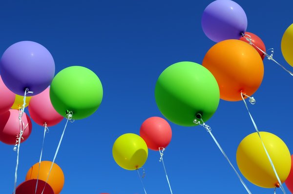 Balloons filled with helium gas.