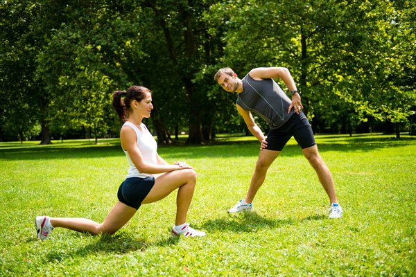 Stretching before exercise.