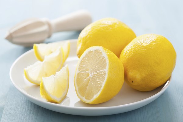 Sliced lemons on a plate.