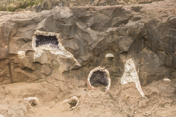 Photo Credit: Sergio Schnitzler/iStock/Getty Images geodes in rock wall
