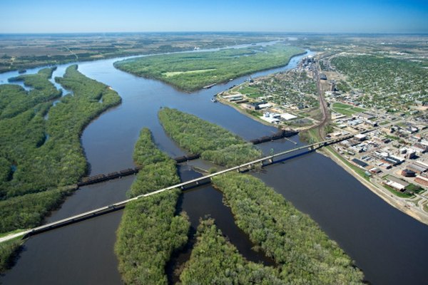 River islands and deltas are formed from deposited sediment.