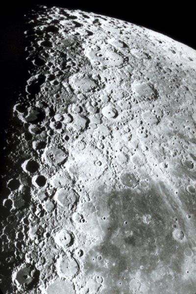 The surface of the moon is covered in craters left by meteorites.