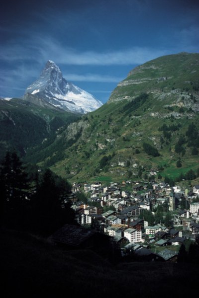 Photo Credit: Ablestock.com/AbleStock.com/Getty Images Towns nestled deep in valleys are often under mountain shadows.
